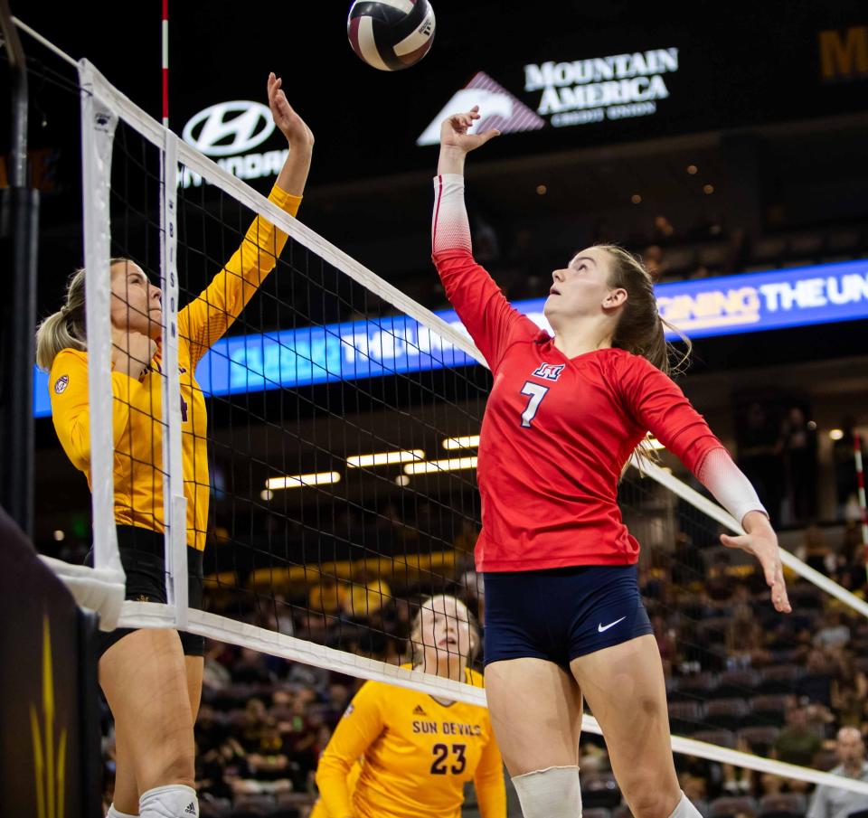 Arizona State Sun Devils women's volleyball opposite hitter Marta Levinska (4) blocks the ball against Arizona Wildcats setter Ana Heath (7) at Mullett Arena in Tempe on Sept. 21, 2023.