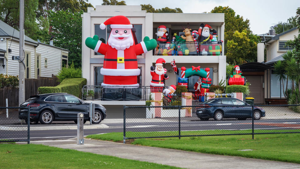 Inflatable Christmas decor outside house