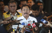 In this Feb. 15, 2020, photo, Indonesian Health Minister Terawan Agus Putranto, center, talks to the media at Halim Perdanakusuma Airport in Jakarta, Indonesia. While its neighbors scrambled early this year to try to contain the spread of the new coronavirus, the government of the world’s fourth most populous nation insisted that everything was fine. Only after the first cases were confirmed in March did President Joko Widodo acknowledge that his government was deliberately holding back information about the spread of the virus to prevent the public from panicking. The country now has the the highest death toll in Asia after China. (AP Photo/Achmad Ibrahim)