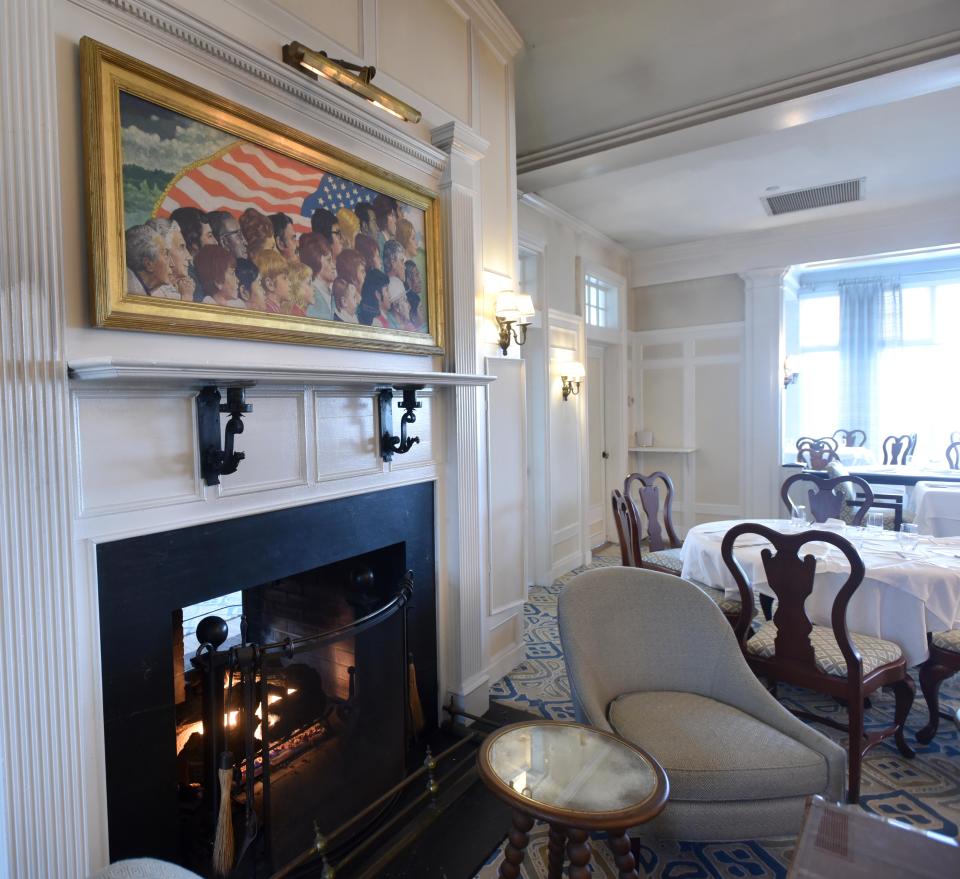 An original Norman Rockwell painting hangs over the fireplace in the Stars dining room at the Chatham Bars Inn.