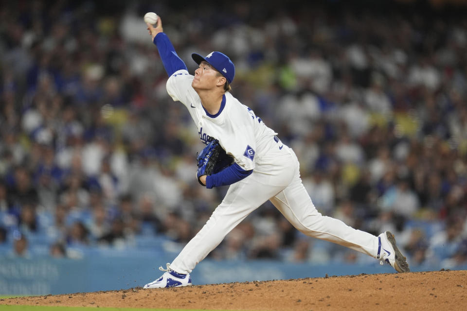 Los Angeles Dodgers pitcher Yoshinobu Yamamoto throws to a Miami Marlins batter during the fourth inning of a baseball game Tuesday, May 7, 2024, in Los Angeles. (AP Photo/Marcio Jose Sanchez)
