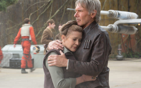 Carrie Fisher and Harrison Ford in The Force Awakens - Credit: Rex