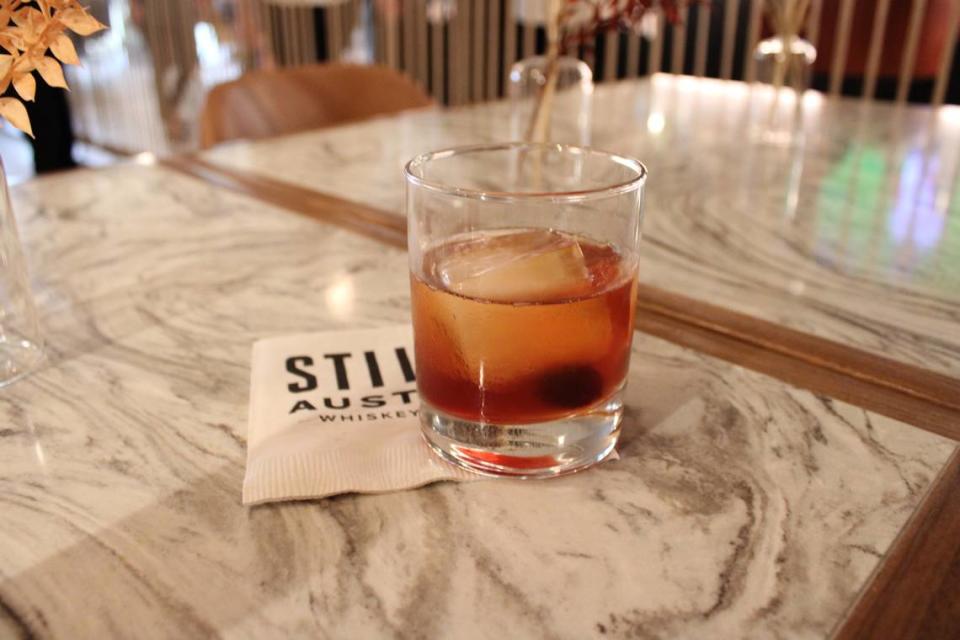 The Oaxacan old fashioned made with Still Austin Whiskey at West + Stone. Tuesday, April, 23, 2024. Ella Gonzales/egonzales@star-telegram.com