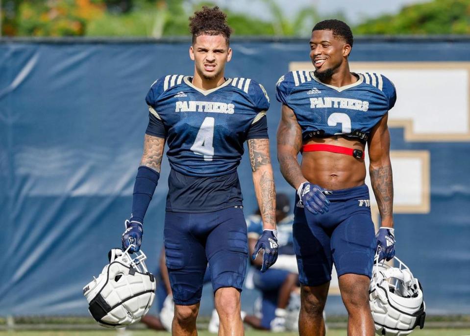 FIU Panthers defensive backs CJ Christian (4) and JoJo Evans (3) move through practice drills at Florida International University in Miami on Tuesday, August 22, 2023.