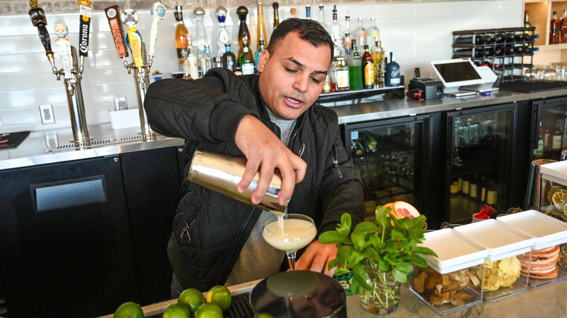 Santos Arevalo of Sabor Cocina Latina & Bar prepares a pisco sour at the restaurant’s new location opening soon in the Park Place shopping center at Palm and Nees in north Fresno after leaving their Fig Garden Drive location.