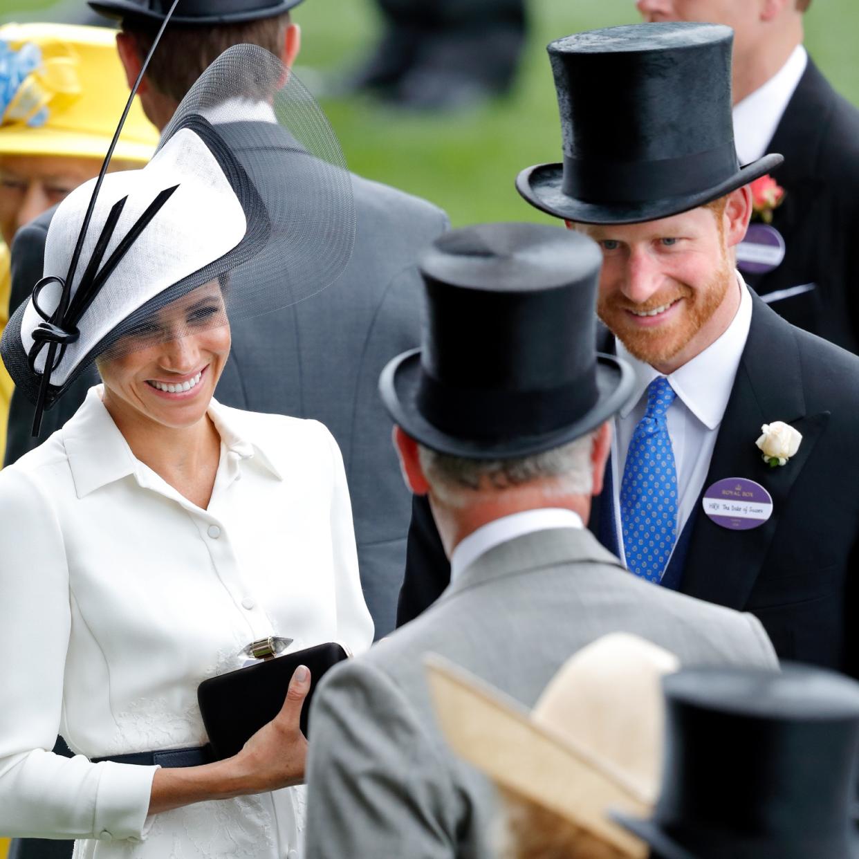  King Charles, Prince Harry, and Meghan Markle. 