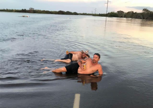 The duo are prone to posing for photos with a beer in hand. Source: Supplied