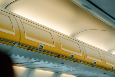 Should overhead bins be locked during take-off and landing? - Credit: GETTY