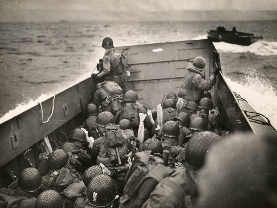 Soldiers of the 1st Infantry Division approach Omaha Beach. 4   Omaha LCVP