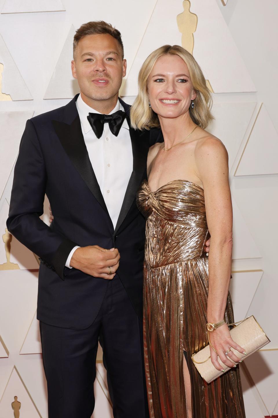 Zach Baylin, left, and wife Kate Susman attend the 94th annual Academy Awards at Hollywood and Highland on March 27, 2022, in Hollywood, Calif.