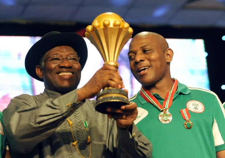 Stephen Keshi (R) with the then-Nigerian President Goodluck Jonathan, celebrating the 2013 African Cup of Nations victory