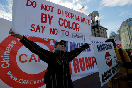 Different groups of supporters attend the "Rally for the American Dream - Equal Education Rights for All," ahead of the start of the trial in a lawsuit accusing Harvard University of discriminating against Asian-American applicants, in Boston, Massachusetts, U.S., October 14, 2018. REUTERS/Brian Snyder