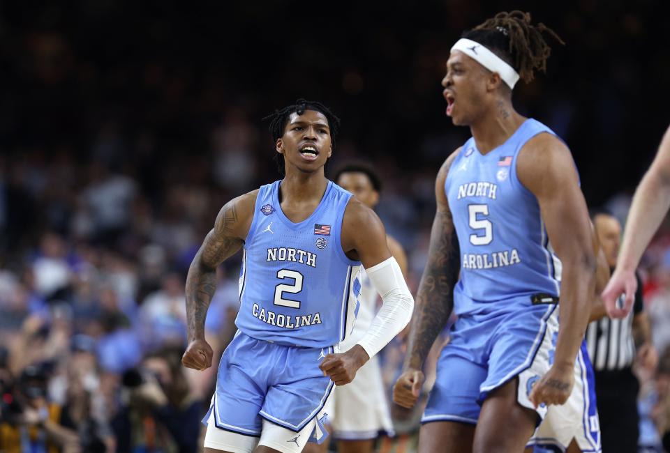 NEW ORLEANS, LOUISIANA - APRIL 02: Caleb Love #2 of the North Carolina Tar Heels reacts in the second half of the game against the Duke Blue Devils during the 2022 NCAA Men's Basketball Tournament Final Four semifinal at Caesars Superdome on April 02, 2022 in New Orleans, Louisiana. (Photo by Jamie Squire/Getty Images)