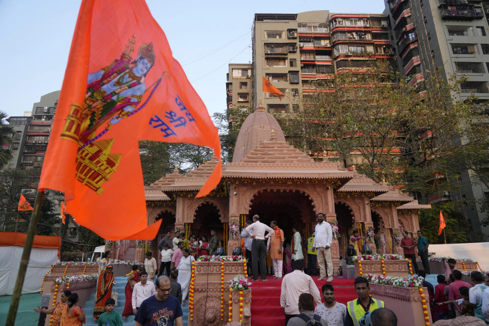 Hindu devotee arrives to visit a replica of the Lord Ram temple of Ayodhya, in Mumbai, India, Sunday, Jan. 21, 2024. (AP Photo/Rafiq Maqbool)