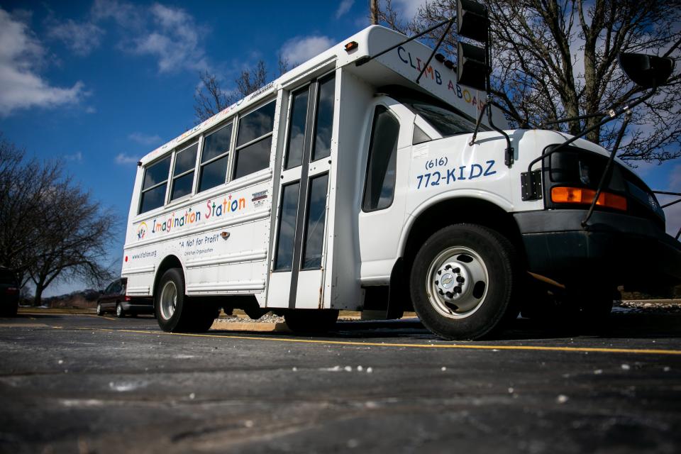 The Imagination Station bus sits in the parking lot Tuesday, March 8, 2022, in Zeeland. According to state-obtained data, more than 1500 childcare providers that submitted applications for Michigan's 2021 Childcare Stabilization Grant saw waitlists. That's more than half of all centers applying for the grant. Providers also report a 20% vacancy rate for full-time childcare providers and 34% for part-time.