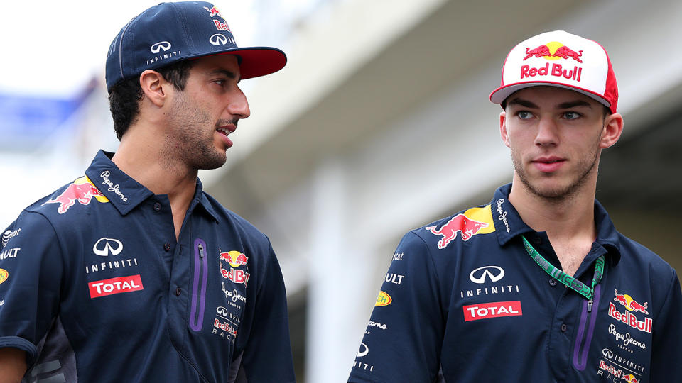 Daniel Ricciardo speaks with Pierre Gasly in the paddock after practice for the Formula One Grand Prix of Brazil at Autodromo Jose Carlos Pace on November 13, 2015 in Sao Paulo, Brazil. (Photo by Mark Thompson/Getty Images)