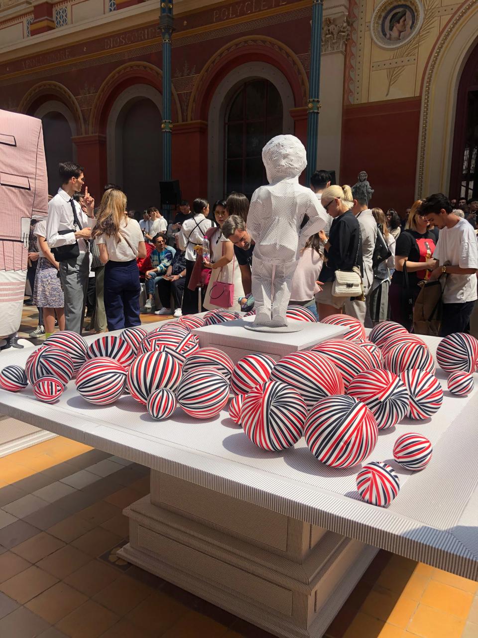 Boyish centerpiece to support the theatrics at Thom Browne.