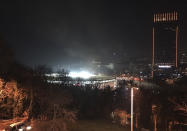 A view of Besiktas football club stadium, following at attack in Istanbul, late Saturday, Dec. 10, 2016. Two loud explosions have been heard near the newly built soccer stadium and witnesses at the scene said gunfire could be heard in what appeared to have been an armed attack on police. (AP Photo) TURKEY OUT