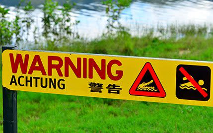 A warning sign in the tropical north of Queensland - Credit: Rex