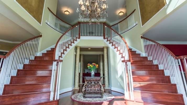 Butterfly stairs in the entryway.