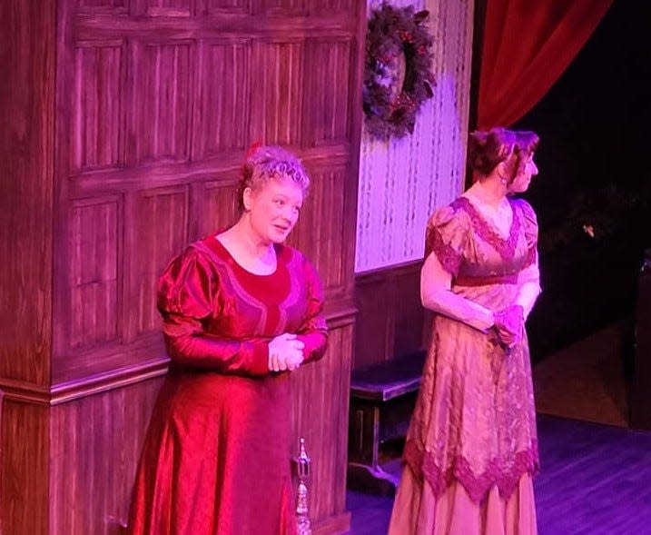 From left, Lindsey Rollins appears as Cassandra Austen and Maddie Wall portrays Jane Austen at the Dec. 10 performance of Oklahoma Shakespeare in the Park's original interactive holiday show "Jane Austen's Christmas Cracker" in Oklahoma City's Paseo Arts District.