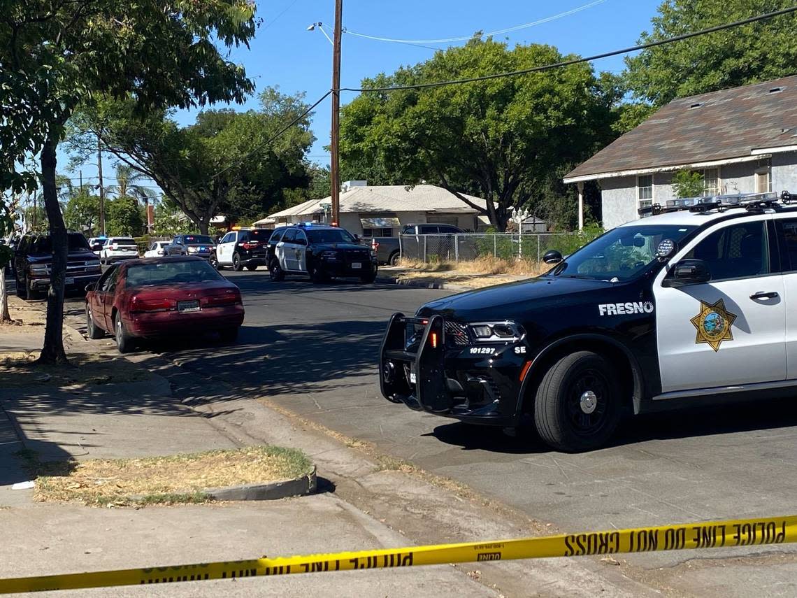 Fresno police blocked off Grant Avenue near Seventh Street in Fresno after California Highway Patrol officers shot a man on Tuesday, Aug. 20, 2024, according to police.