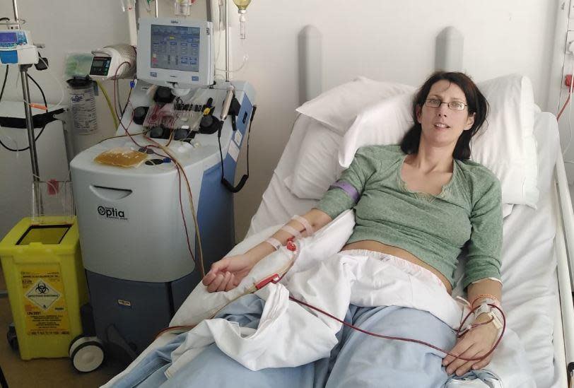 Rebecca Wrixon lays in her bed at University Hospital   Southampton in England, in early April 2020, just before doctors began giving her plasma exchange treatment. At this point an inflammation in her brain caused by COVID-19 infection had left Wrixon unable to move half of her body, see clearly or speak.  / Credit: Courtesy of Rebecca Wrixon