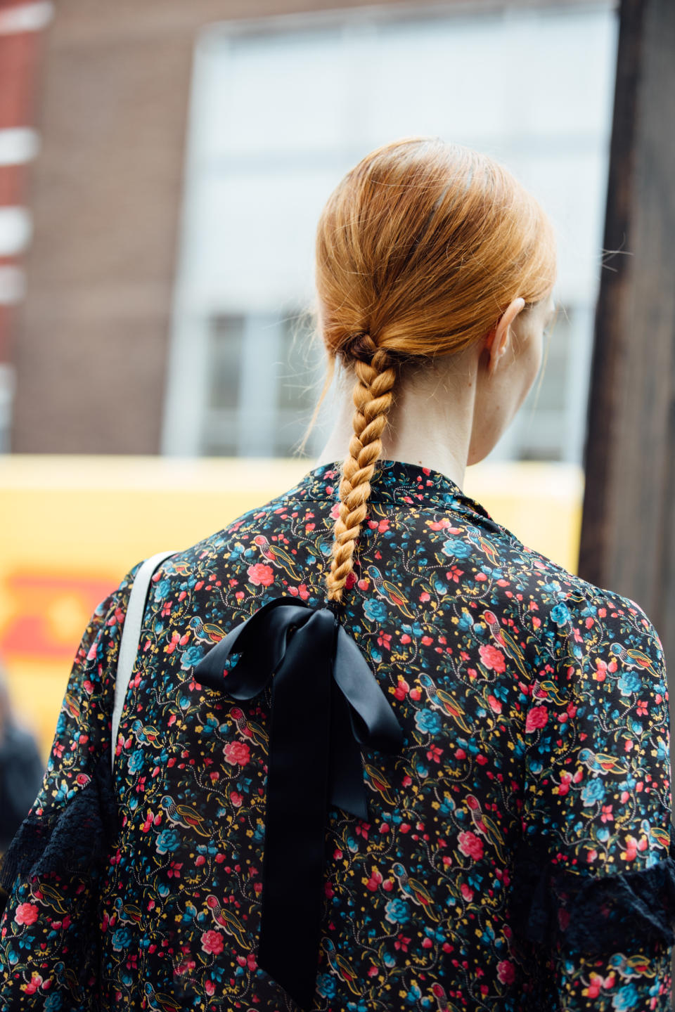 LONDON, ENGLAND - SEPTEMBER 16: A model with a braided ponytail and bow in the hair after the Erdem show during London Fashion Week September 2019 on September 16, 2019 in London, England. (Photo by Melodie Jeng/Getty Images)