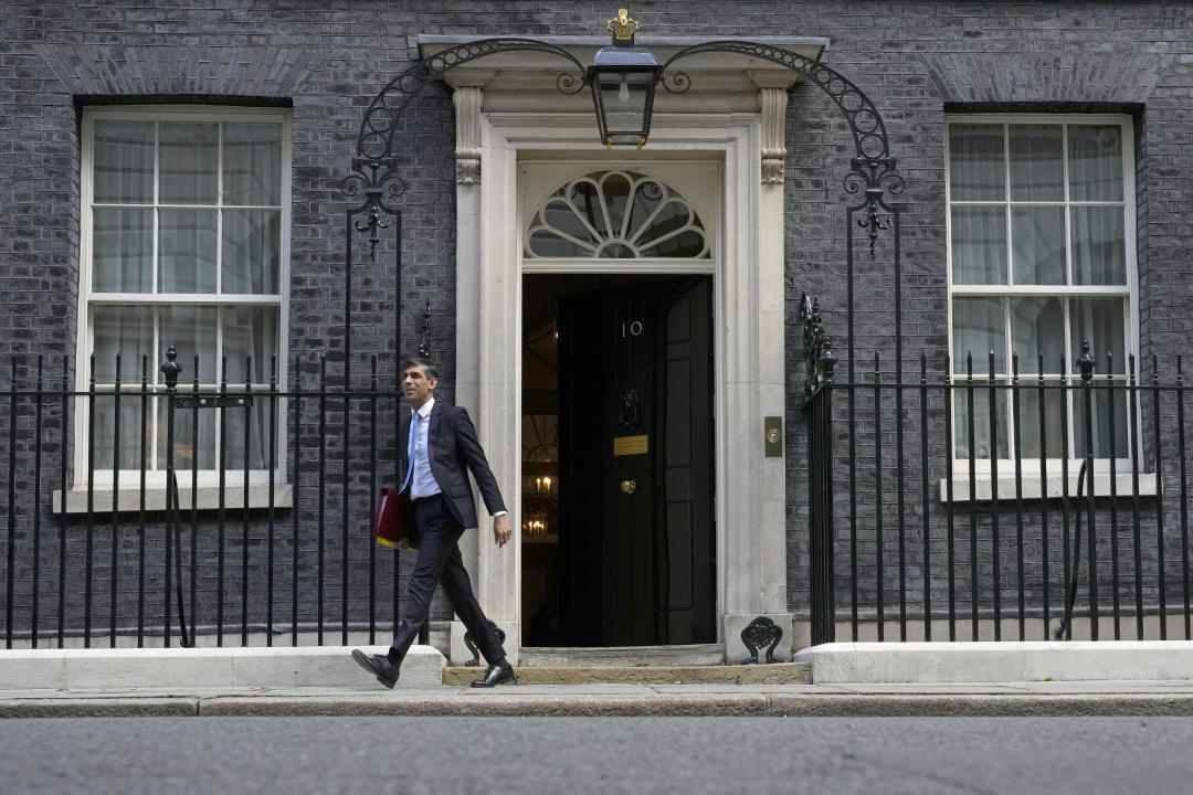 Britain's Prime Minster Rishi Sunak departs 10 Downing Street to go to the House of Commons for his weekly Prime Minister's Questions in London, Wednesday, April 17, 2024. (AP Photo/Alastair Grant)