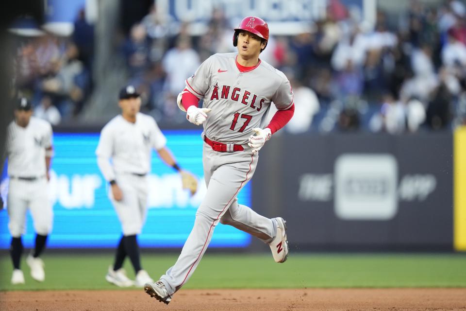 Los Angeles Angels' Shohei Ohtani runs the bases after hitting a two-run home run against the New York Yankees during the first inning of a baseball game Tuesday, April 18, 2023, in New York. (AP Photo/Frank Franklin II)