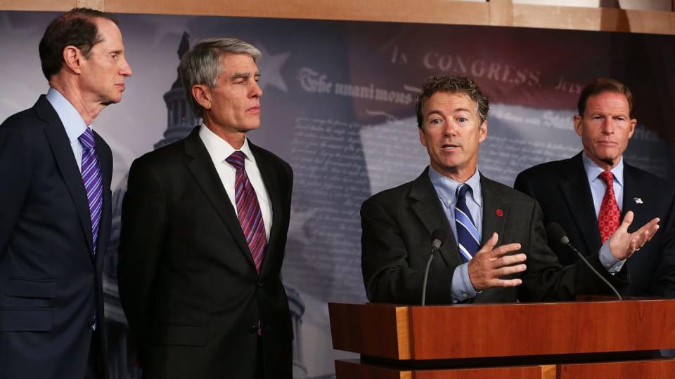 A photo including U.S Sen. Rand Paul, Sen. Ron Wyden, Sen. Mark Udall, U.S. Sen. Richard Blumenthal in Capitol Hill in Washington, DC.