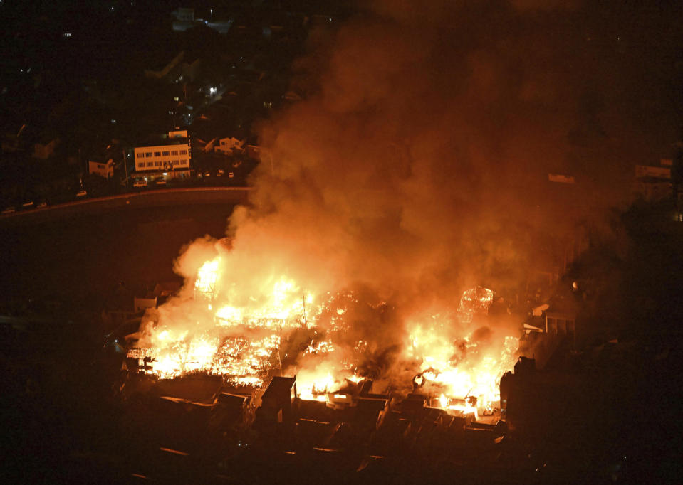 This shows a fire occurred following an earthquake in Wajima, Ishikawa prefecture, Japan Monday, Jan. 1, 2024. Japan issued tsunami alerts and told people to evacuate seaside areas after a series of strong quakes on its western coastline Monday. (Kyodo News via AP)