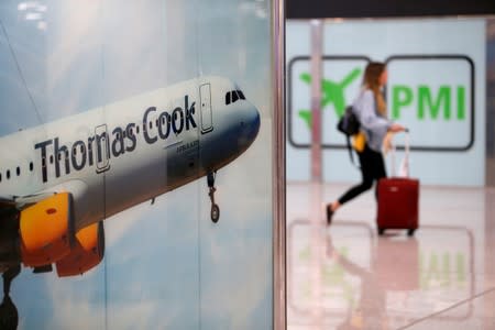 Thomas Cook banner is seen at Mallorca Airport after the world's oldest travel firm collapsed, in Palma de Mallorca