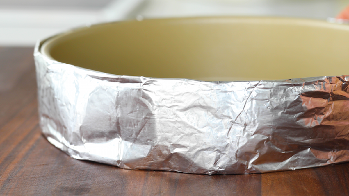 <em>Prepping pans for homemade carrot cake</em><p>Parade</p>