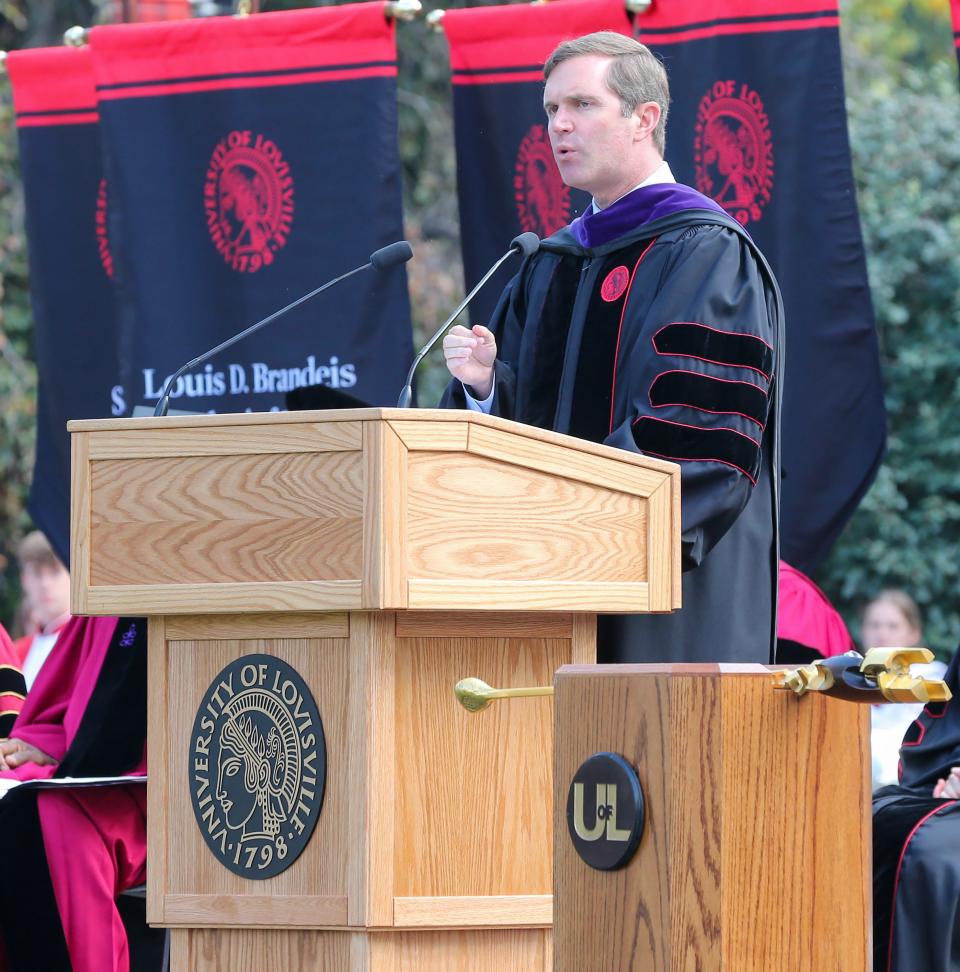 Kentucky Governor Andy Beshear makes his remarks during the inauguration ceremony for UofL President Kim Schatzel in front of Grawemeyer Hall on Friday, September 29, 2023.  Schatzel becomes the university’s 19th president.  