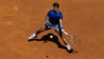 Spain's Rafael Nadal returns the ball to fellow countryman Albert Ramos during the Barcelona open tennis in Barcelona, Spain, Wednesday, April 23, 2014. (AP Photo/Manu Fernandez)