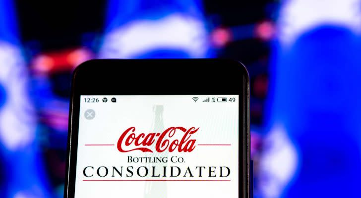 The website for Coca-Cola Consolidated (COKE) displayed on a smartphone screen.