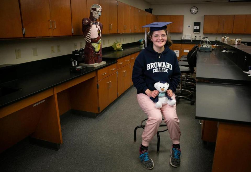 Sawsan Ahmed is not even a teenager, but she’s about to graduate from Broward College at the age of 12. Sawsan is pictured in a biology lab at the college on Dec. 13, 2021.