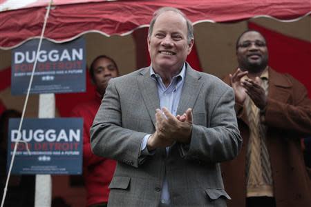 Detroit mayoral candidate Mike Duggan addresses a crowd of supporters during a campaign stop in the neighborhood he lived in as a child in Detroit, Michigan November 2, 2013. REUTERS/Rebecca Cook