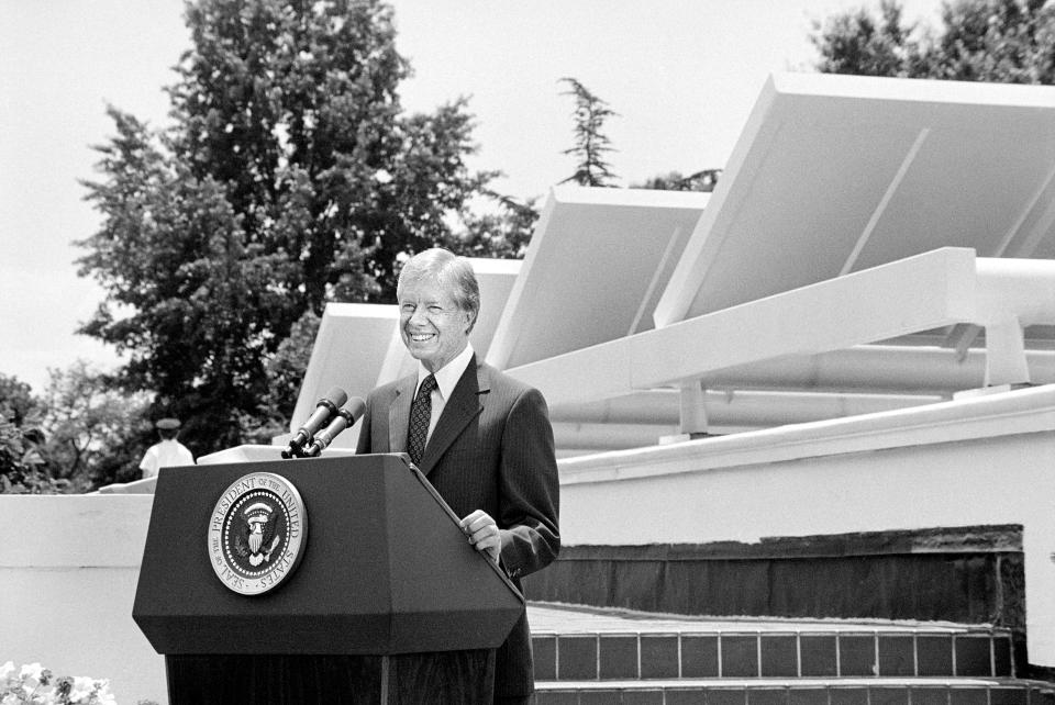 June 20, 1979: President Jimmy Carter speaks in front of solar panels placed on West Wing Roof of White House, announcing his solar energy policy, Washington, D.C. / Credit: Universal History Archive/Universal Images Group via Getty Images