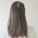 <p>ON one side Dutch braid halfway down your head and secure into place with a hair tie. </p>