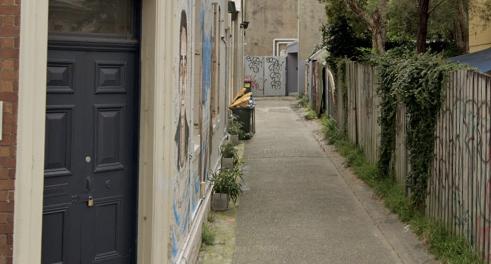 The alleyway on a cleaner day. 