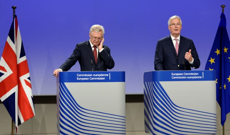 EU Brexit negotiator Michel Barnier (R) says after talks with his British counterpart David Davis that the two sides remain at odds on Britain's divorce bill and over the rights of European citizens living in Britain