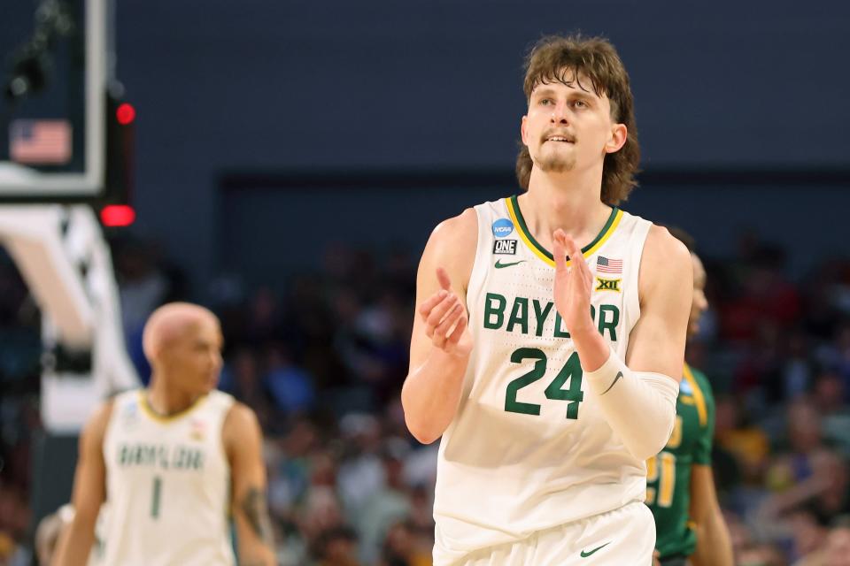 Matthew Mayer enjoys a moment during Baylor’s blowout victory against Norfolk State in the first round of the NCAA Tournament at Dickies Arena in Fort Worth, Texas.