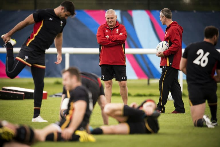 Wales' head coach Warren Gatland (C) supervises a training session at London Irish Amateur Rugby Football Club in Sunbury, on October 8, 2015, during the Rugby World Cup