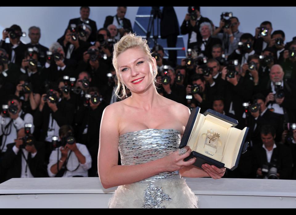 Actress Kirsten Dunst poses after winning Best Actress for the film 'Melancholia' at the Palme d'Or Winners Photocall at the Palais des Festivals during the 64th Cannes Film Festival on May 22, 2011 in Cannes, France.  (Pascal Le Segretain, Getty Images)