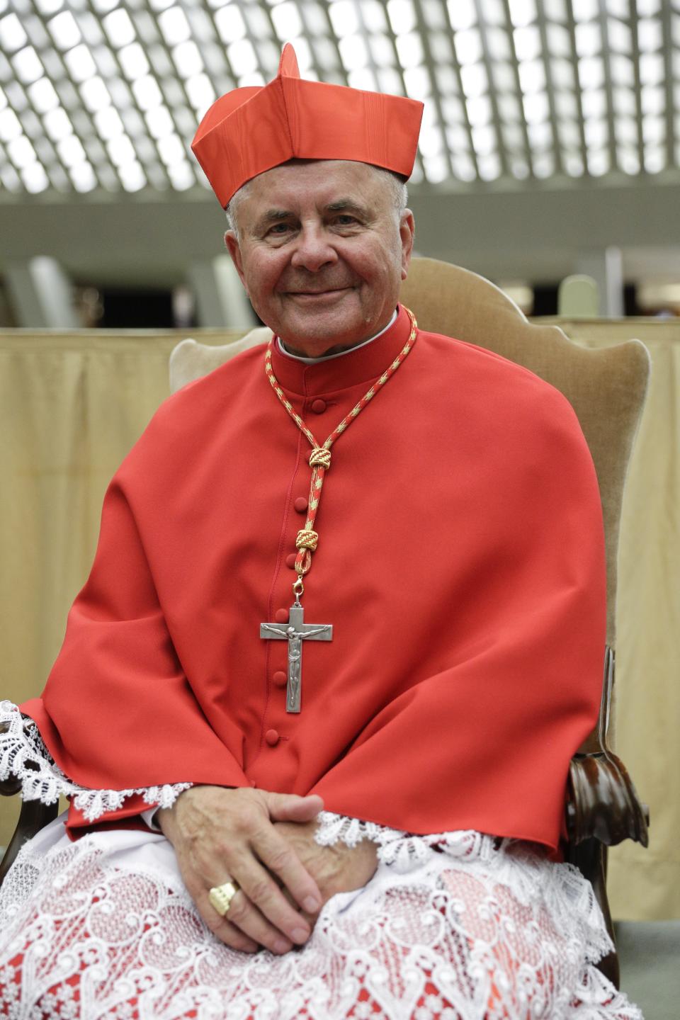 Cardinal Sigitas Tamkevicius poses for photographers prior to meeting relatives and friends after he was elevated to cardinal by Pope Francis, at the Vatican, Saturday, Oct. 5, 2019. Pope Francis has chosen 13 men he admires and whose sympathies align with his to become the Catholic Church's newest cardinals. (AP Photo/Andrew Medichini)