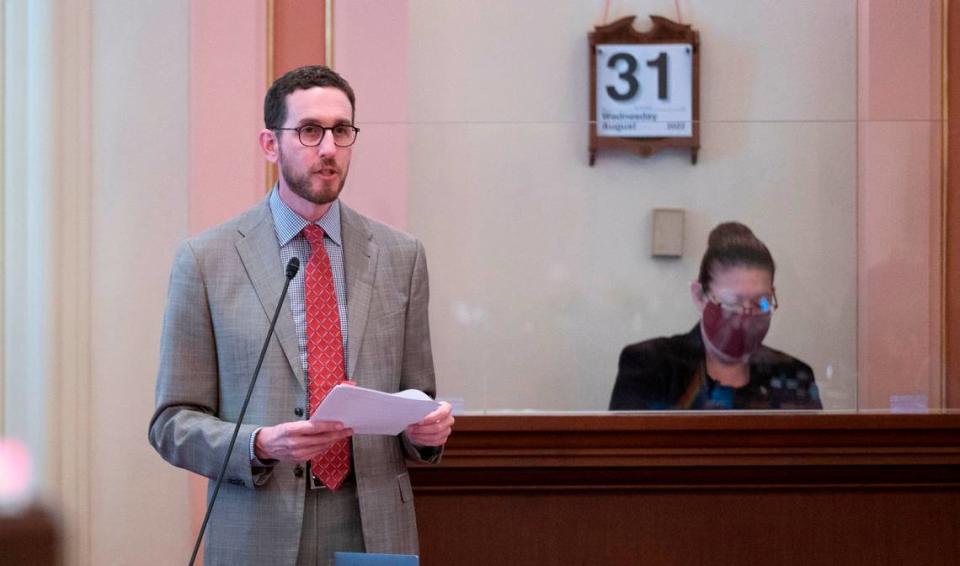 State Sen. Scott Wiener, D-San Francisco, talks to members of the Senate during the last day of legislative session in 2022.