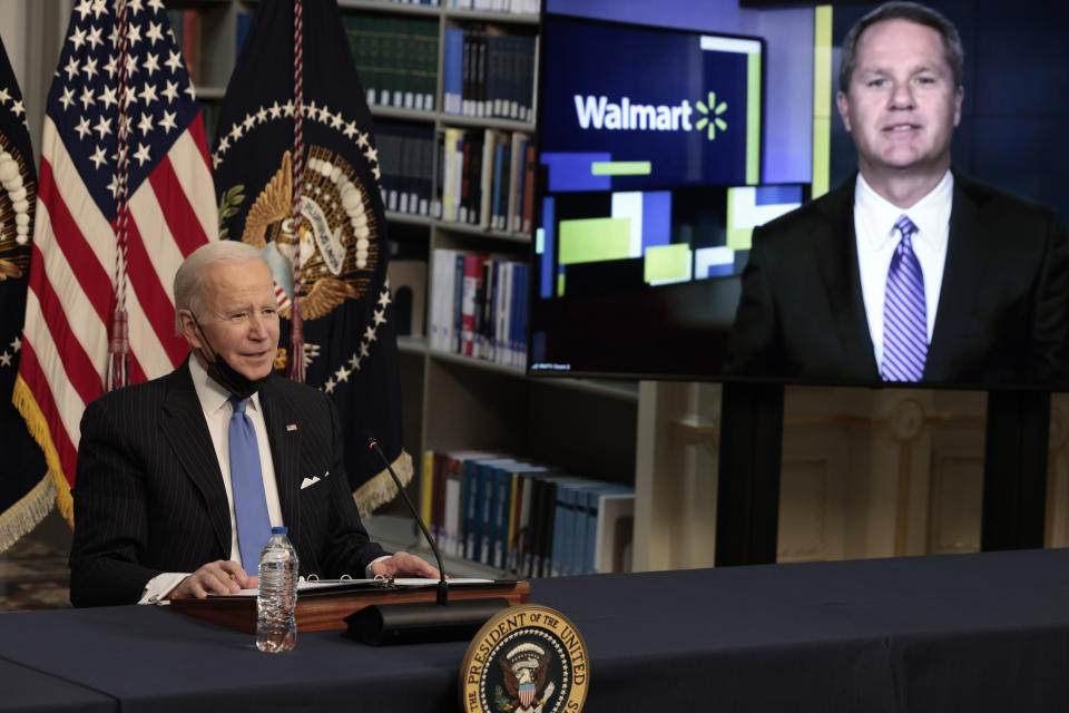 WASHINGTON, DC - NOVEMBER 29: U.S. President Joe Biden listens as the CEO of Walmart Doug McMillon speaks remotely at a hybrid virtual roundtable with CEOs and leaders of retail, consumer products firms, and grocery store chains in the Eisenhower Executive Office Building on November 29, 2021 in Washington, DC. During the roundtable, President Biden spoke on his administration’s plans to keep stores supplied ahead of the holiday season. (Photo by Anna Moneymaker/Getty Images)