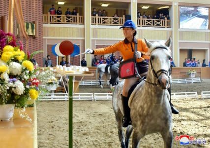 People take part in a horse riding game at the Mirim Equestrian Riding Club in Pyongyang, North Korea October 15, 2017, in this picture released by North Korea's Korean Central News Agency (KCNA) in Pyongyang.  KCNA/via REUTERS